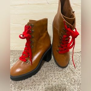 Steve Madden heeled combat Boots. Fashionista and stylish